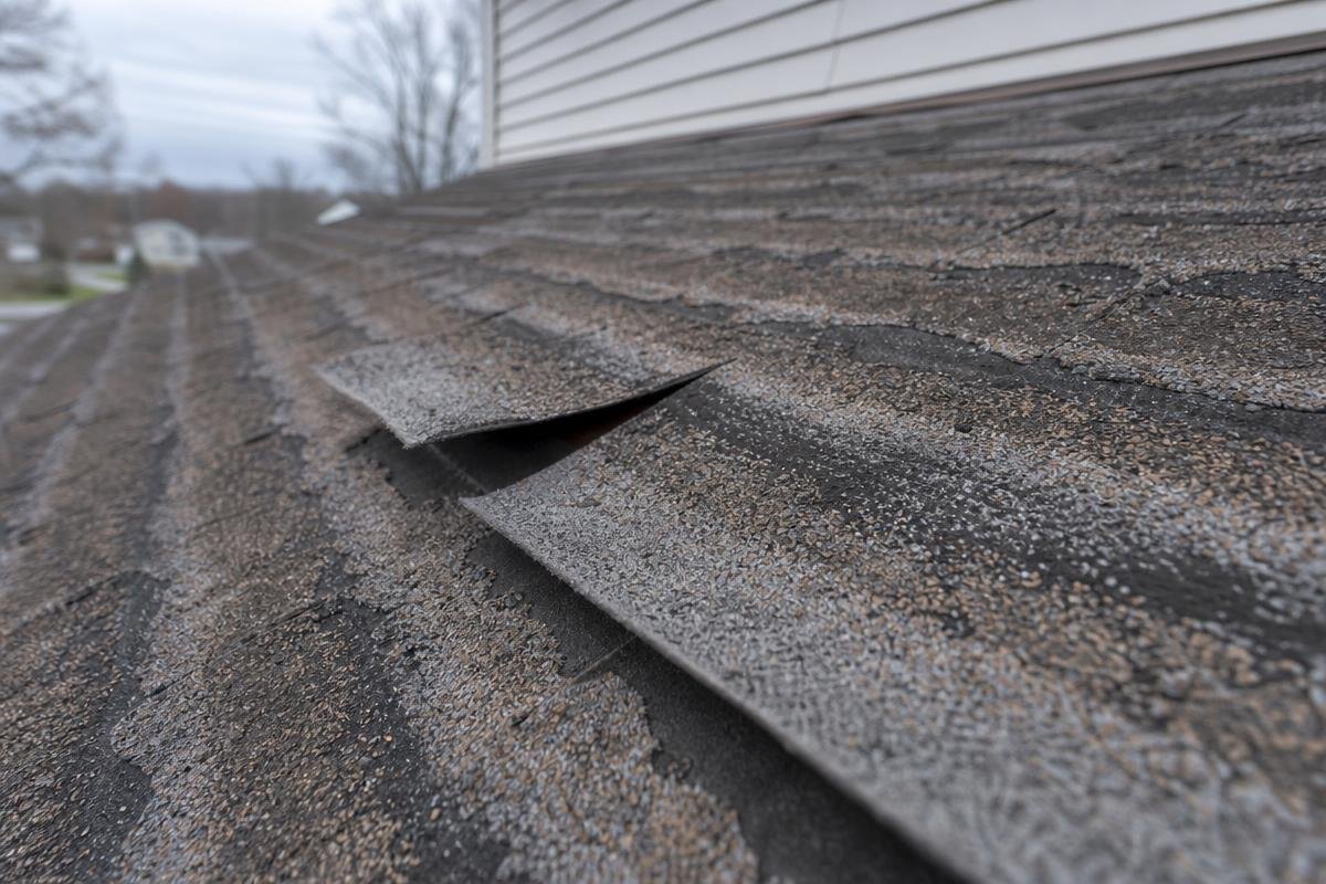 wind and hail damage roof repair on asphalt shingles in Shingle Springs, CA