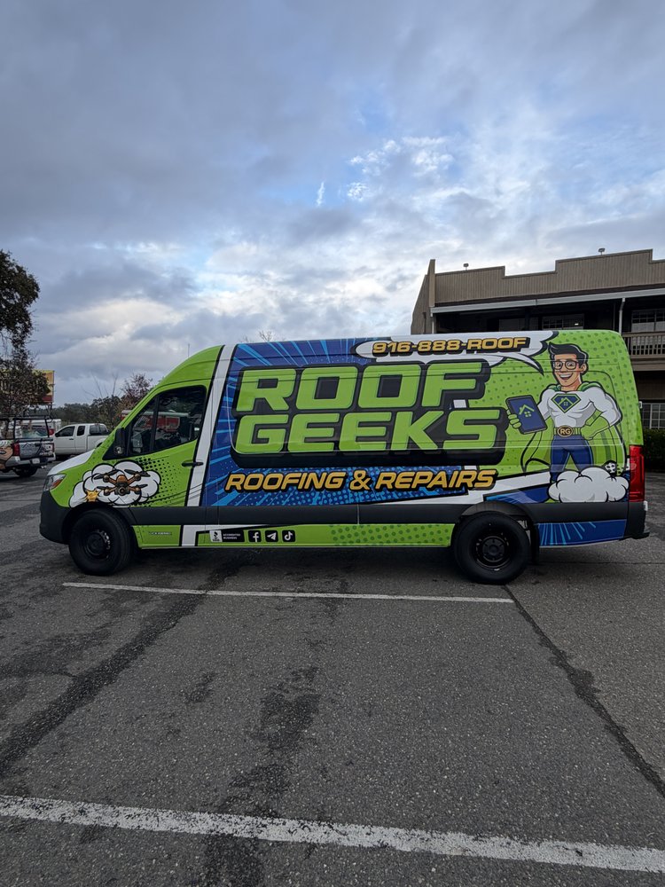 Roof Geeks branded service van on site